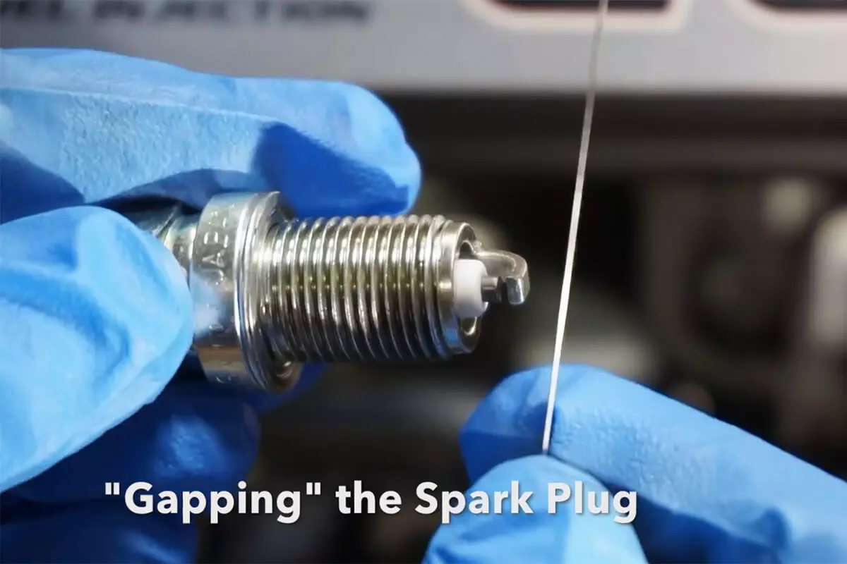 use-the-feeler-gauge-to-measure-the-spark-plug-gap.jpg